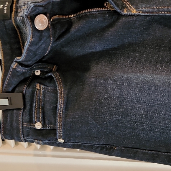 Dark bue jeans w/small slit at ankle. - Picture 3 of 7